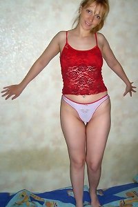 Big-titted girls in sultry embrace, passionately kissing