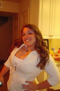 Sensual, voluptuous fat woman posing seductively in lingerie