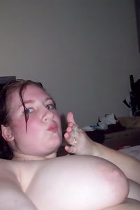 Voluptuous BBW woman passionately engaged in oral sex