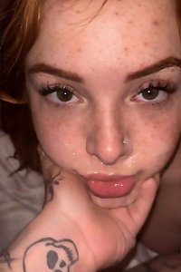 Busty girls in a passionate embrace, their big breasts pressing together